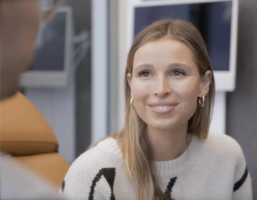 Friendly dentist consultation with patient at The Tooth Co.